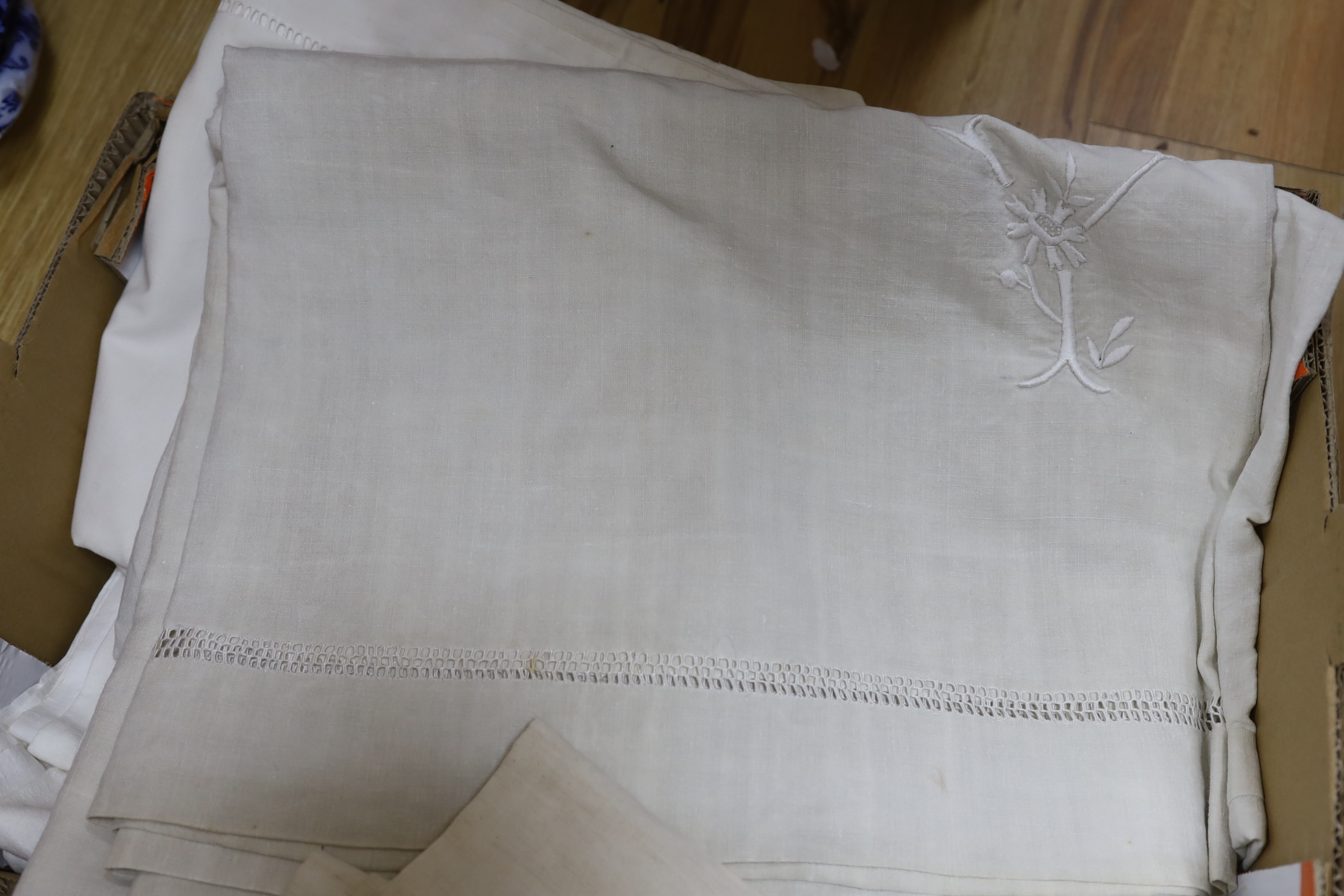 Six heavily embroidered French linen sheets
